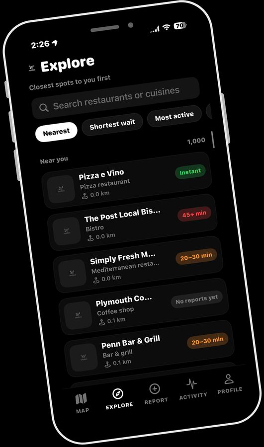 The Explore tab listing nearby restaurants sorted by distance with their current wait.